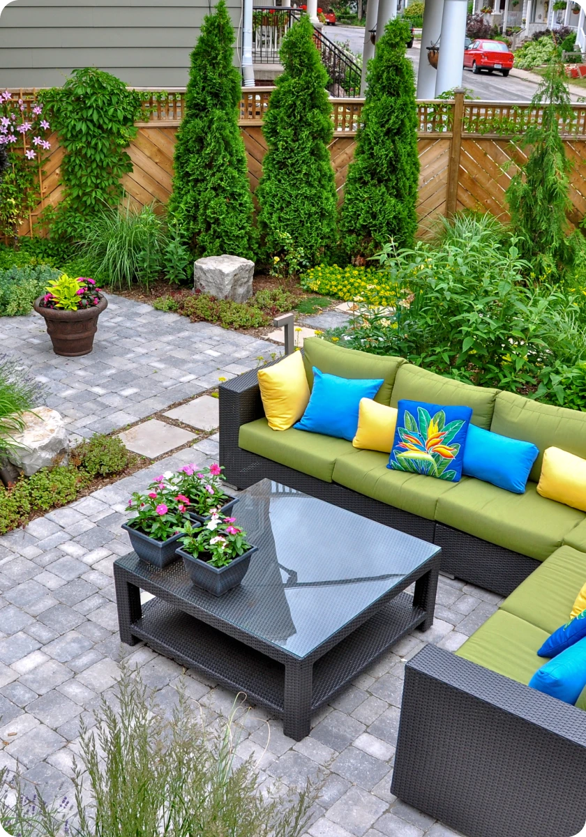 Colorful patio seating with garden view